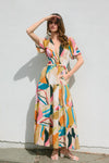 Feelin Groovy Plunnge Neckline Maxi Dress
