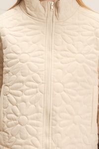 Daisy Quilted Mock Neck Zip Jacket in Cream — close-up of mock neck and full zip-front closure