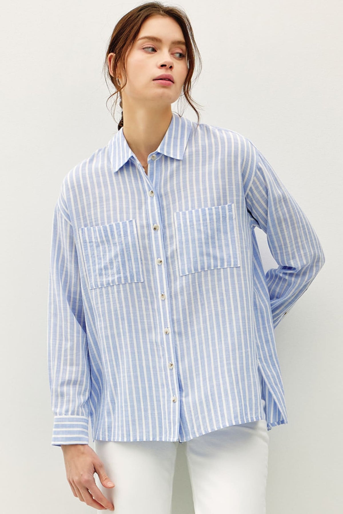 Baby Blue Button Up Stripe Top in Baby Blue — front view on model
