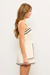 Adriana Embroidered Edge Romper in Black