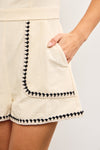 Adriana Embroidered Edge Romper in Black