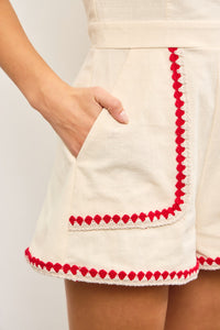 Adriana Embroidered Edge Romper in Red