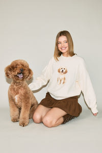 Cockapoo Graphic Oversized Crew Neck Sweater in Ivory — close-up of knit Cockapoo dog graphic and ribbed cuffs