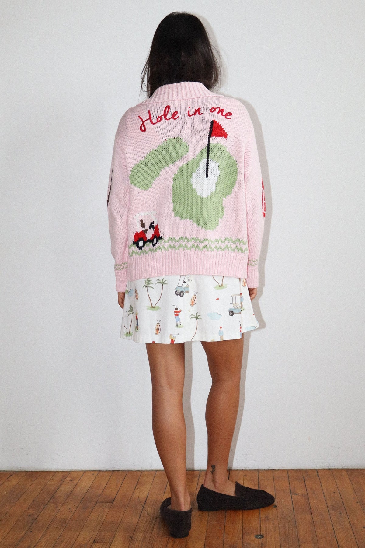 Hole in One Zip Front Graphic Sweater