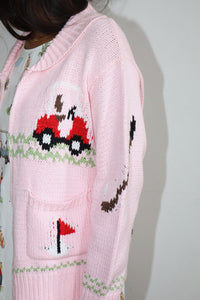 Hole in One Zip Front Graphic Sweater
