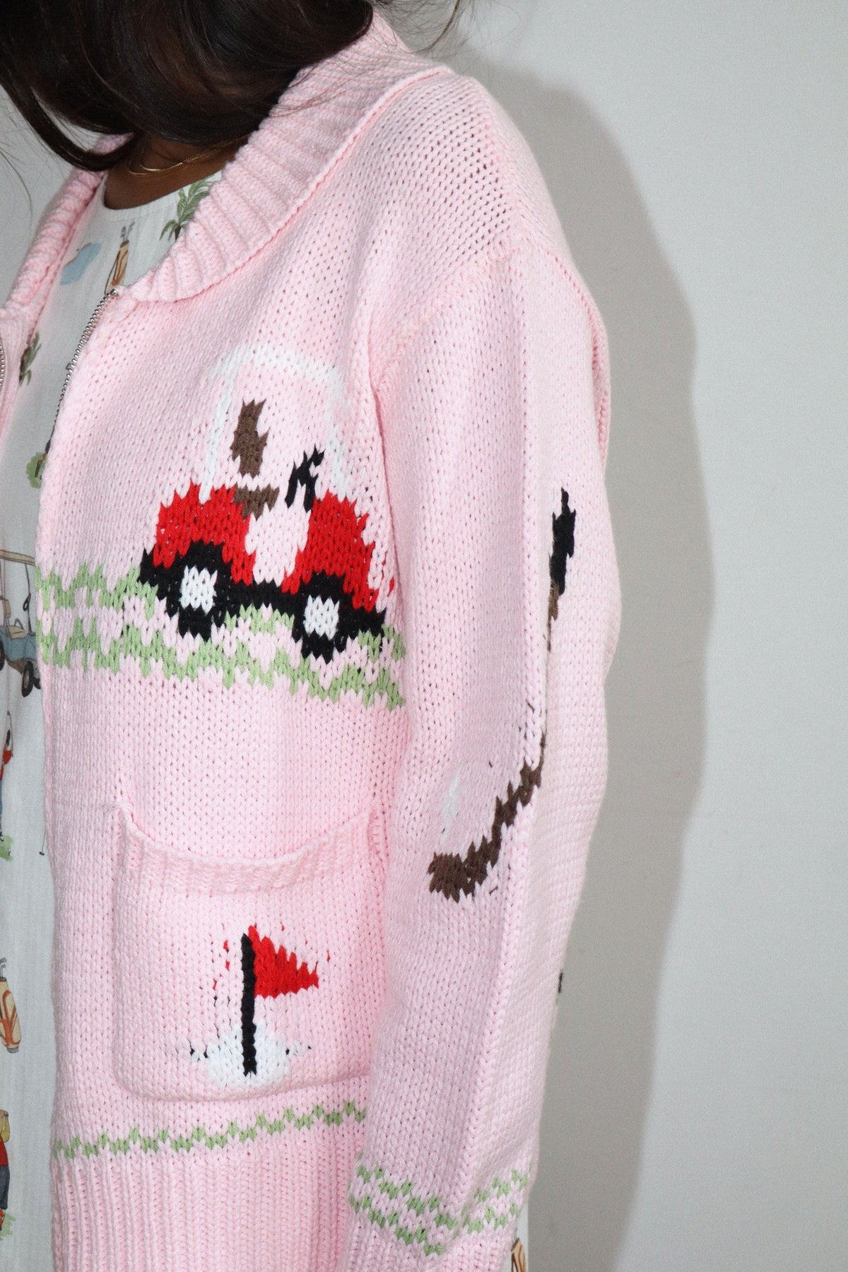 Hole in One Zip Front Graphic Sweater