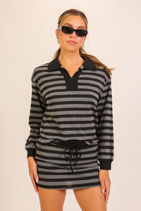 Rally Stripe Collared Top & Skort Set in Black — front view on model showing matching top and skort