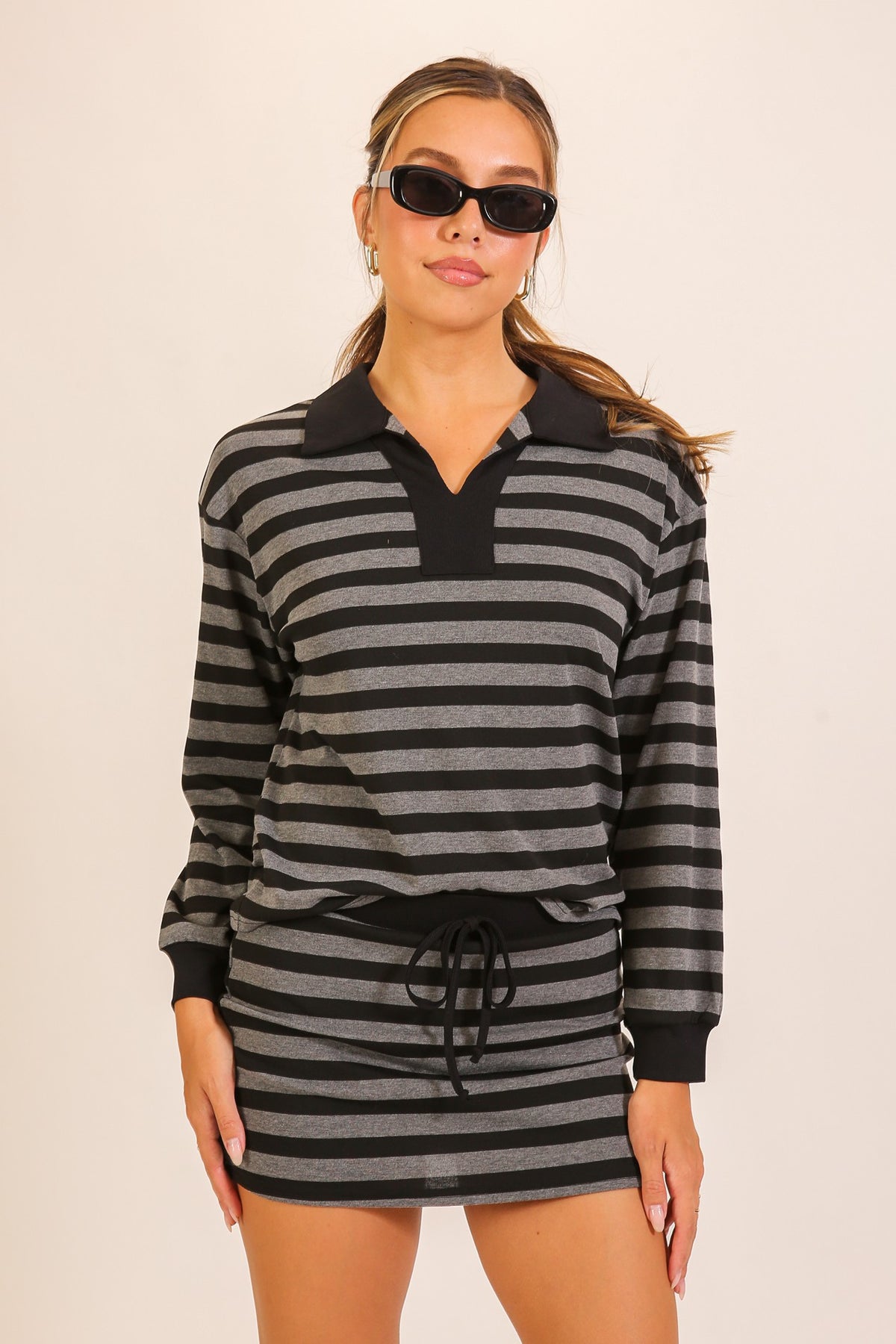Rally Stripe Collared Top & Skort Set in Black — front view on model showing matching top and skort