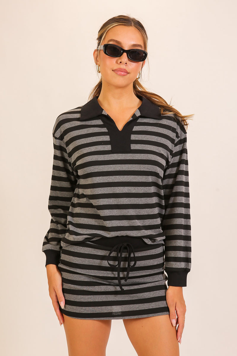 Rally Stripe Collared Top & Skort Set in Black — front view on model showing matching top and skort