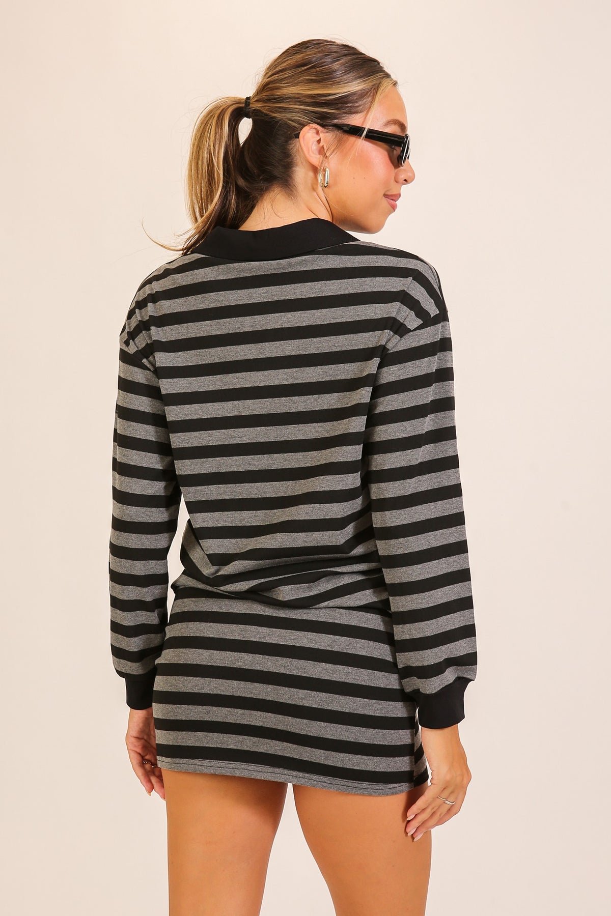 Rally Stripe Collared Top & Skort Set in Black — side view showing collared pullover and skort silhouette