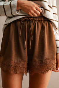 Satin Lace Trim Drawstring Shorts in Chocolate — front view on model