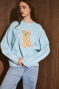 Golden Doodle Graphic Oversized Knit Sweater in Light Blue — side view showing drop-shoulder oversized fit
