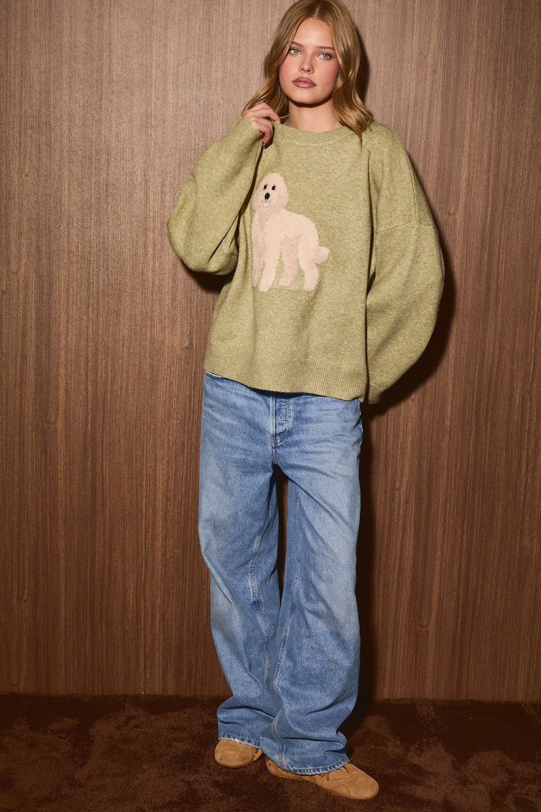 Goldendoodle Graphic Oversized Crew Neck Sweater in Olive — styled on model with bottoms