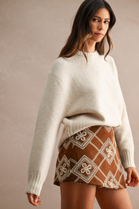 Maison Marled Crew Neck Knit Sweater in Taupe — side view showing dropped shoulders and relaxed fit