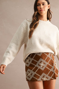 Maison Marled Crew Neck Knit Sweater in Taupe — front view on model