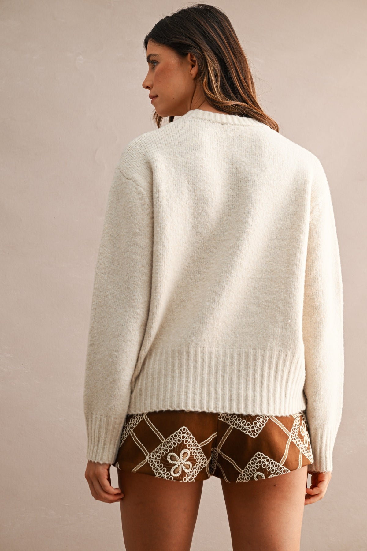 Maison Marled Crew Neck Knit Sweater in Taupe — back view on model