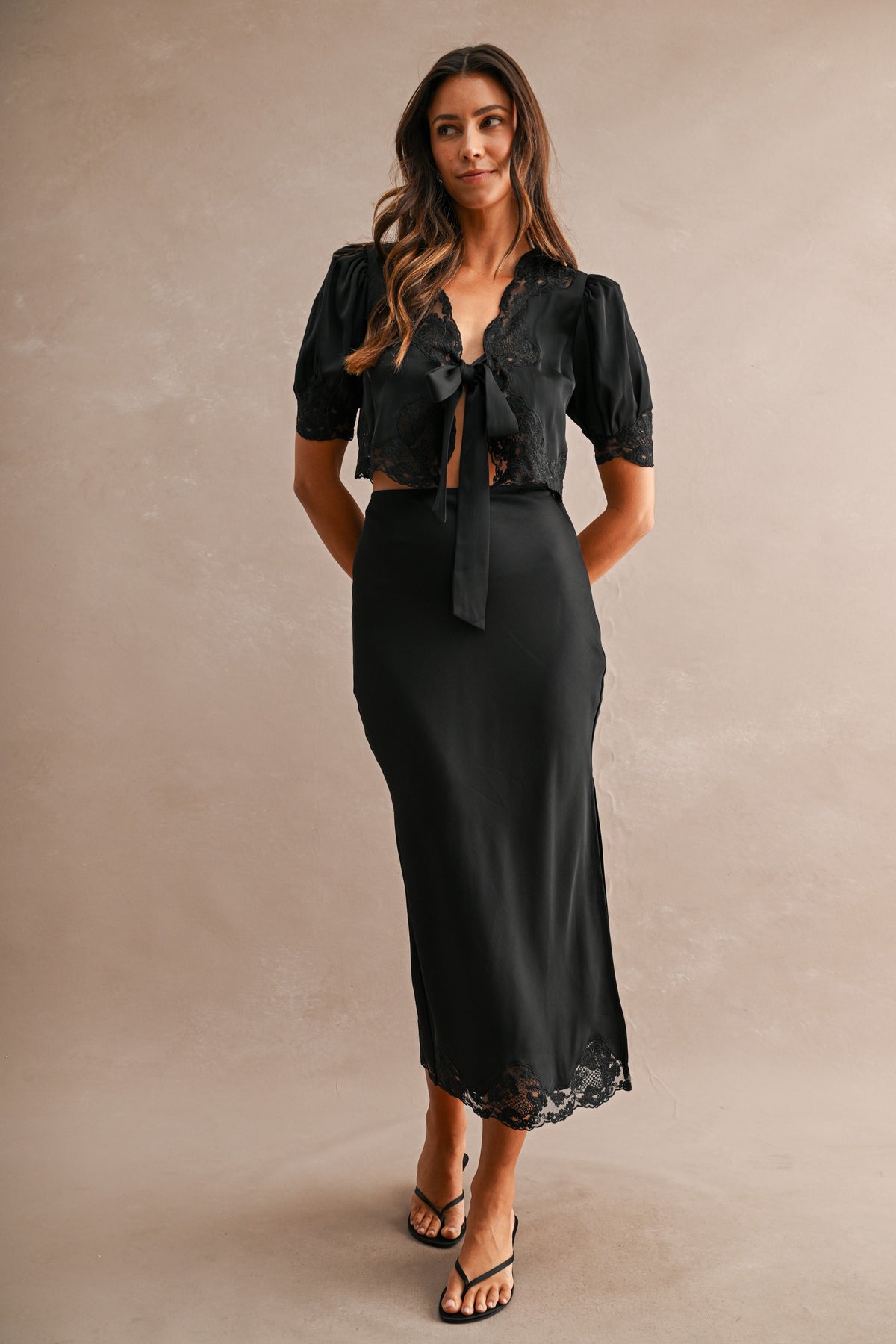 Evangeline Satin Lace Trim Midi Skirt in Black