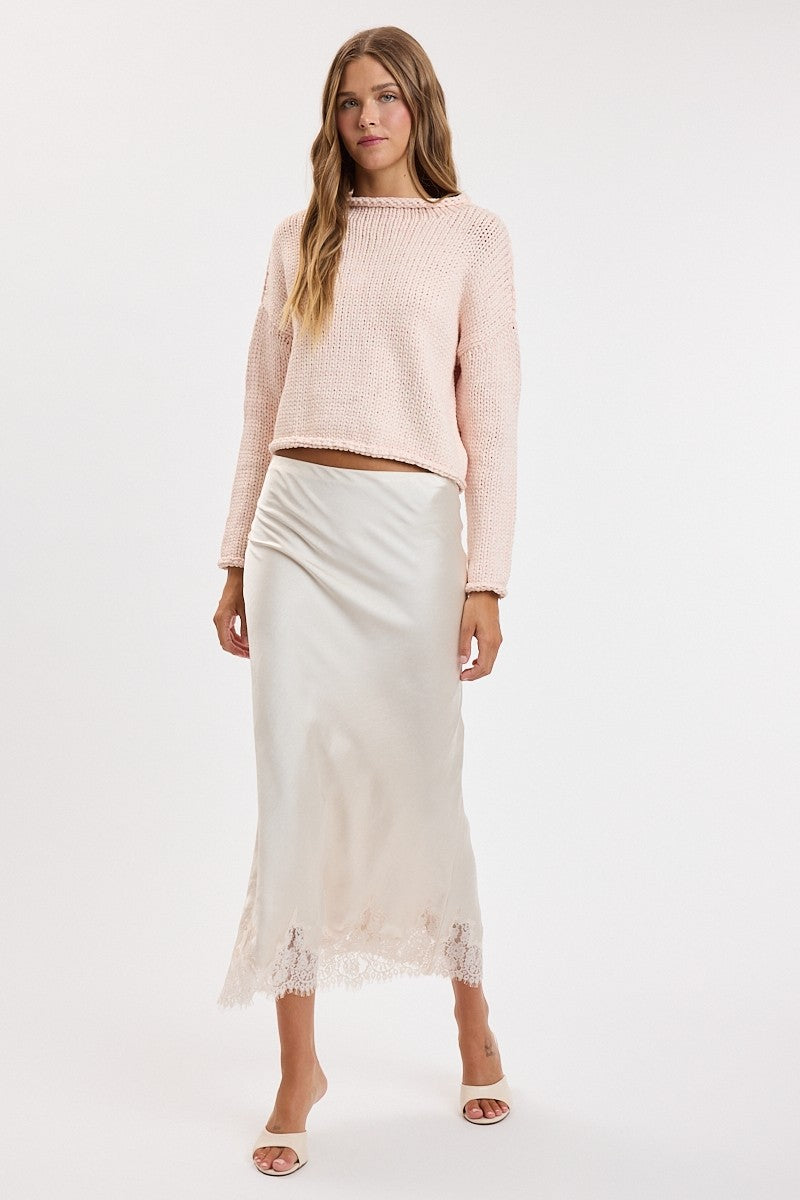 Blush Chunky Knit Rolled Boat Neck Sweater in Pink — close-up of chunky knit texture