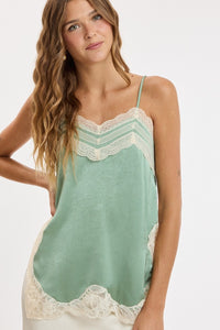 Pearl Textured Satin Lace Detail Top in Sage — styled on model with bottoms
