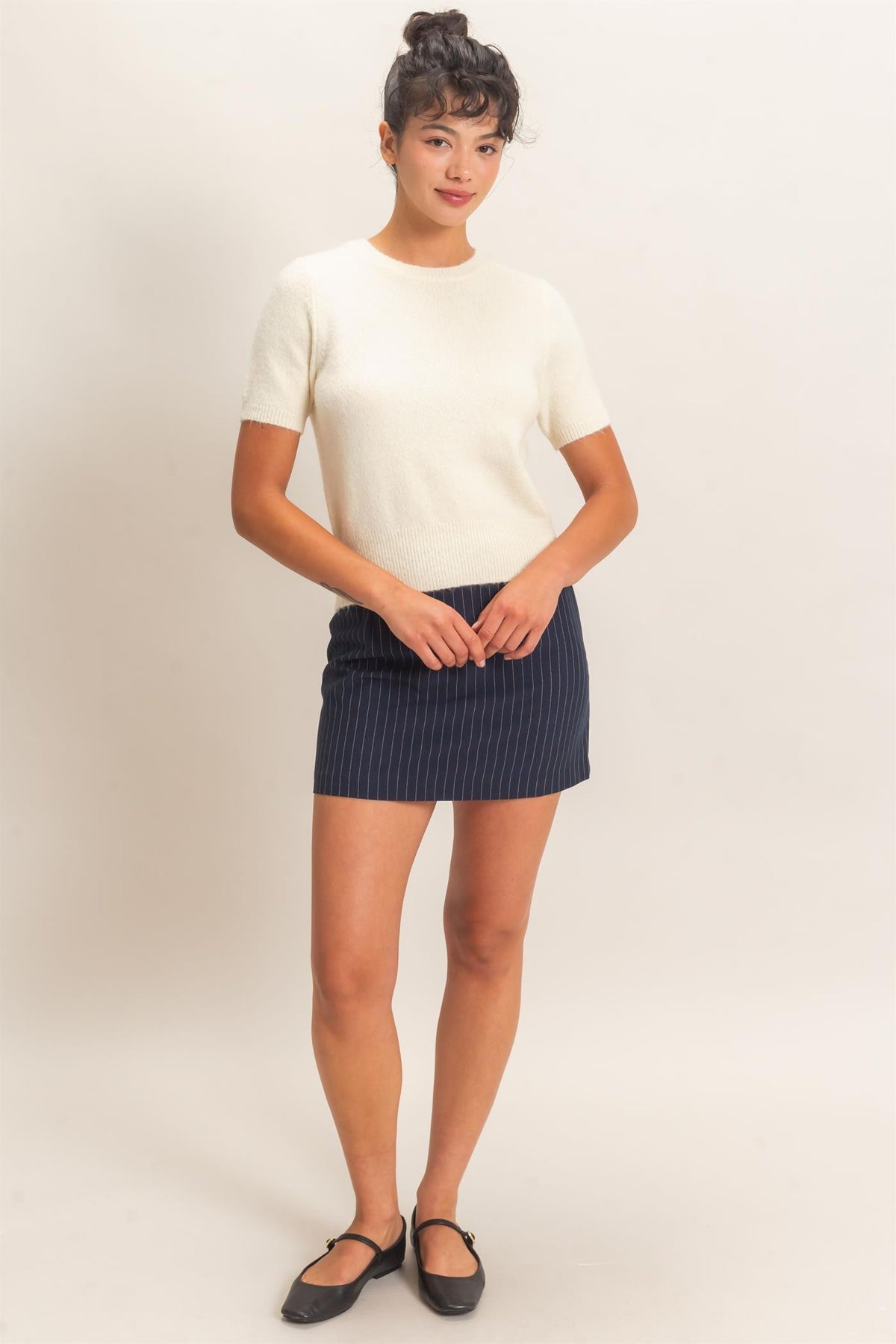Wren Crew Neck Short Sleeve Knit Top in Cream — close-up of soft knit texture