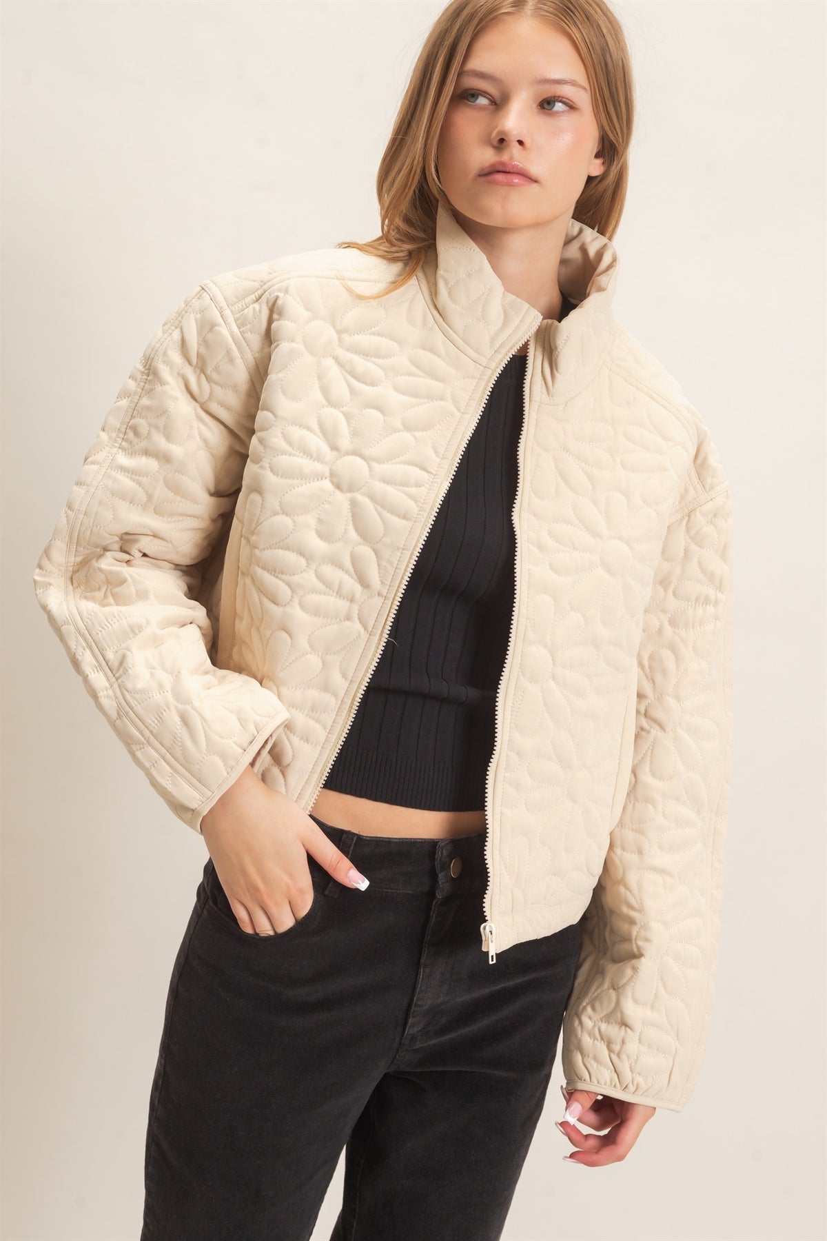 Daisy Quilted Mock Neck Zip Jacket in Cream — front view on model