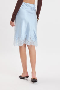Luna Satin Lace Trim Midi Skirt in Light Blue — side view showing lace trim hem and midi length